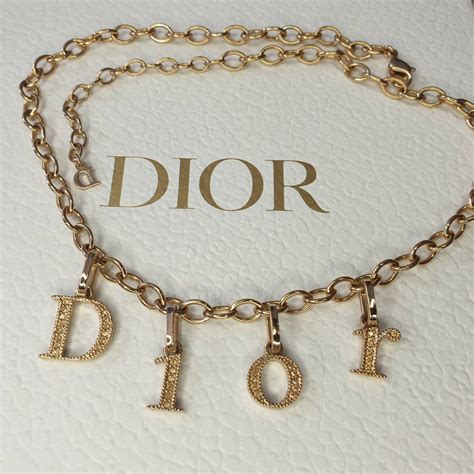 christian dior gold chain ring|dior letters necklace value.